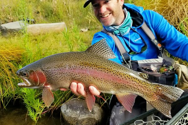 A trophy Truckee River rainbow trout with guide Matt Heron