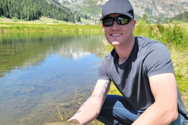 Mike with a nice rainbow trout in a fly fishing class