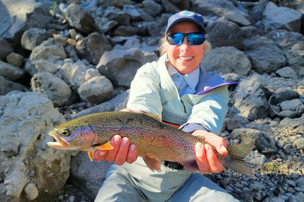 Lynn with a little Truckee river rainbow trout