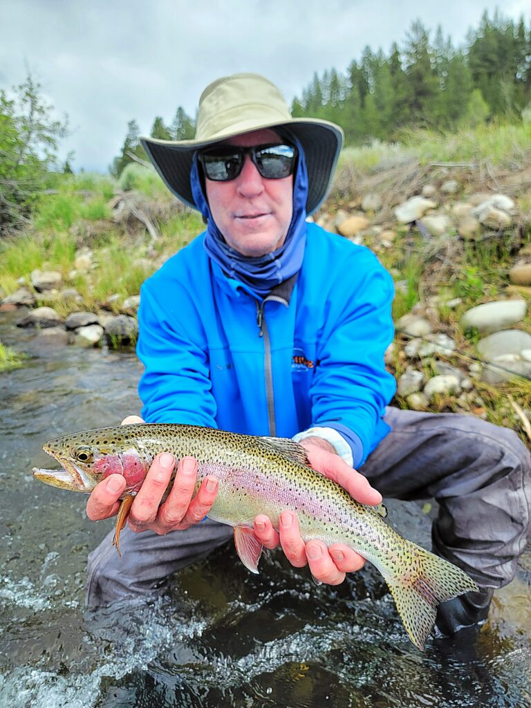 Truckee river full day guide tip. Jay with a nice rainbow.