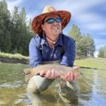 Beginner learning to fly fish on the Truckee River.