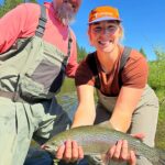 Couple fly fishing near Lake Tahoe.