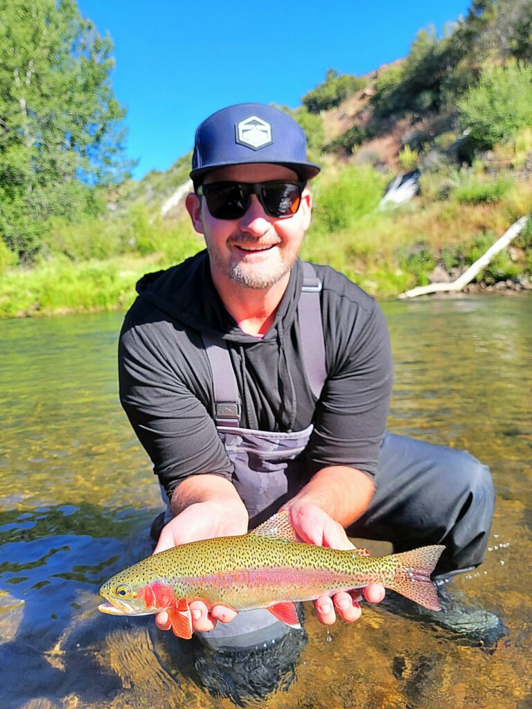 Fly fishing the Truckee River during summer at sunrise, showing ideal conditions for trout fishing in June, July, and August.
